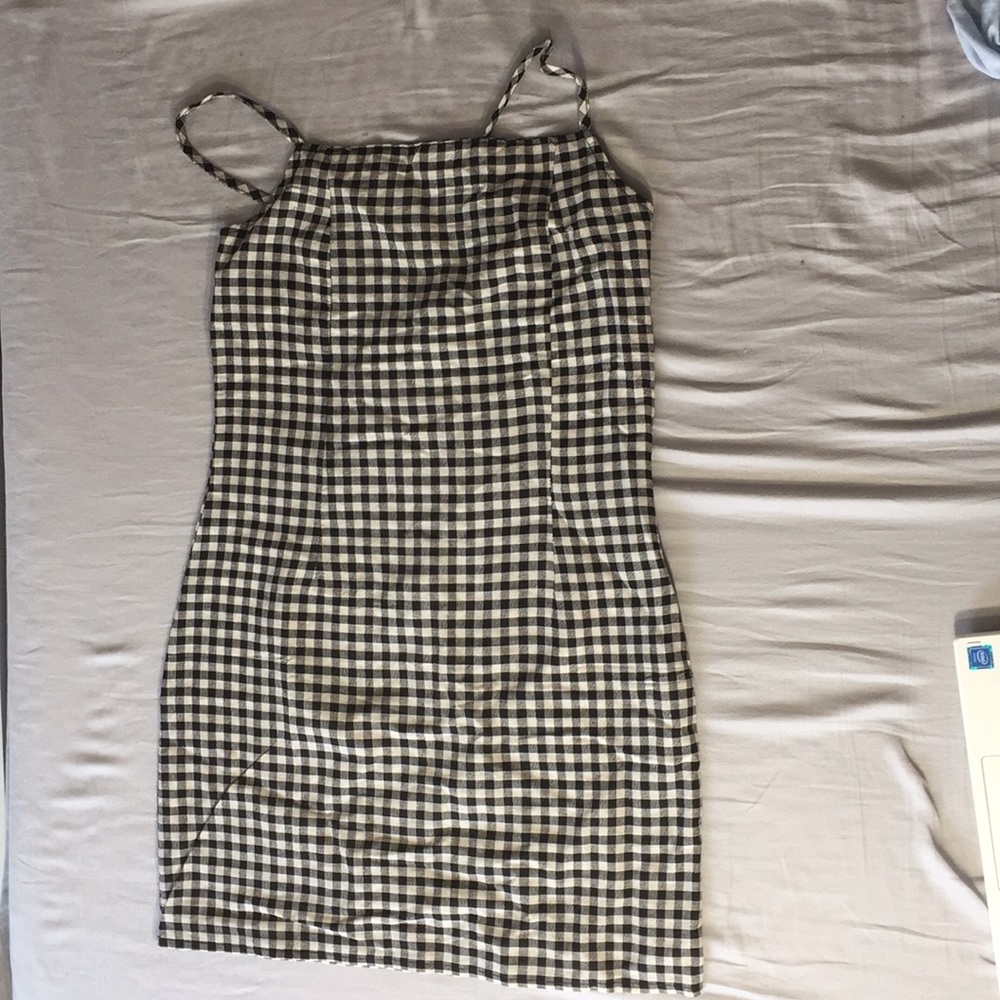 I am selling a black and white gingham dress.